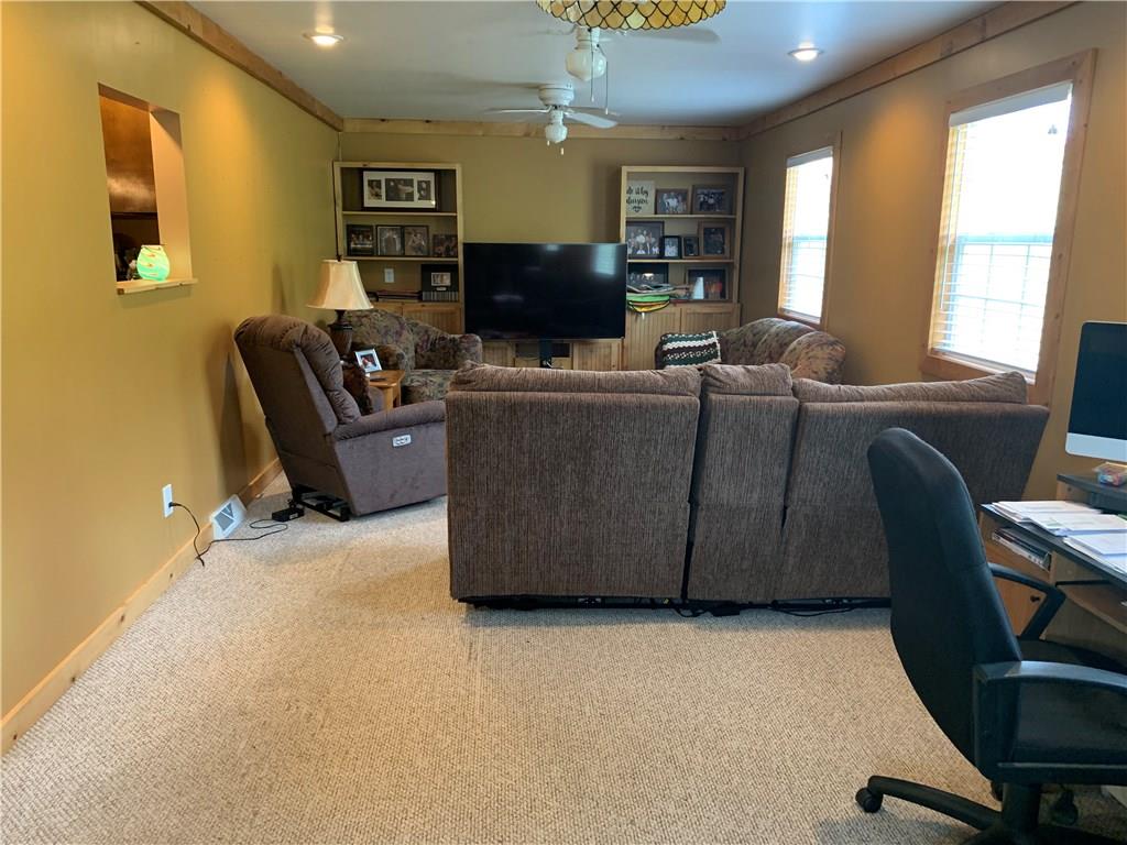 741 Wolf Avenue Rochester, PA 15074 - Photo 17 of 22 a living room with furniture and a flat screen tv