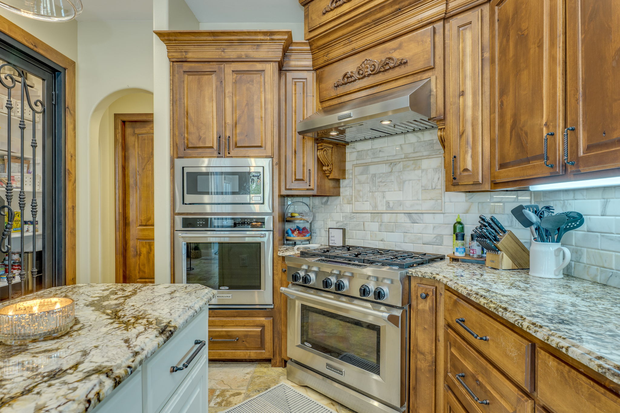 2703 Pyramid Drive Austin, TX 78734 - Photo 18 of 37 a kitchen with stainless steel appliances granite countertop a stove and a granite counter tops