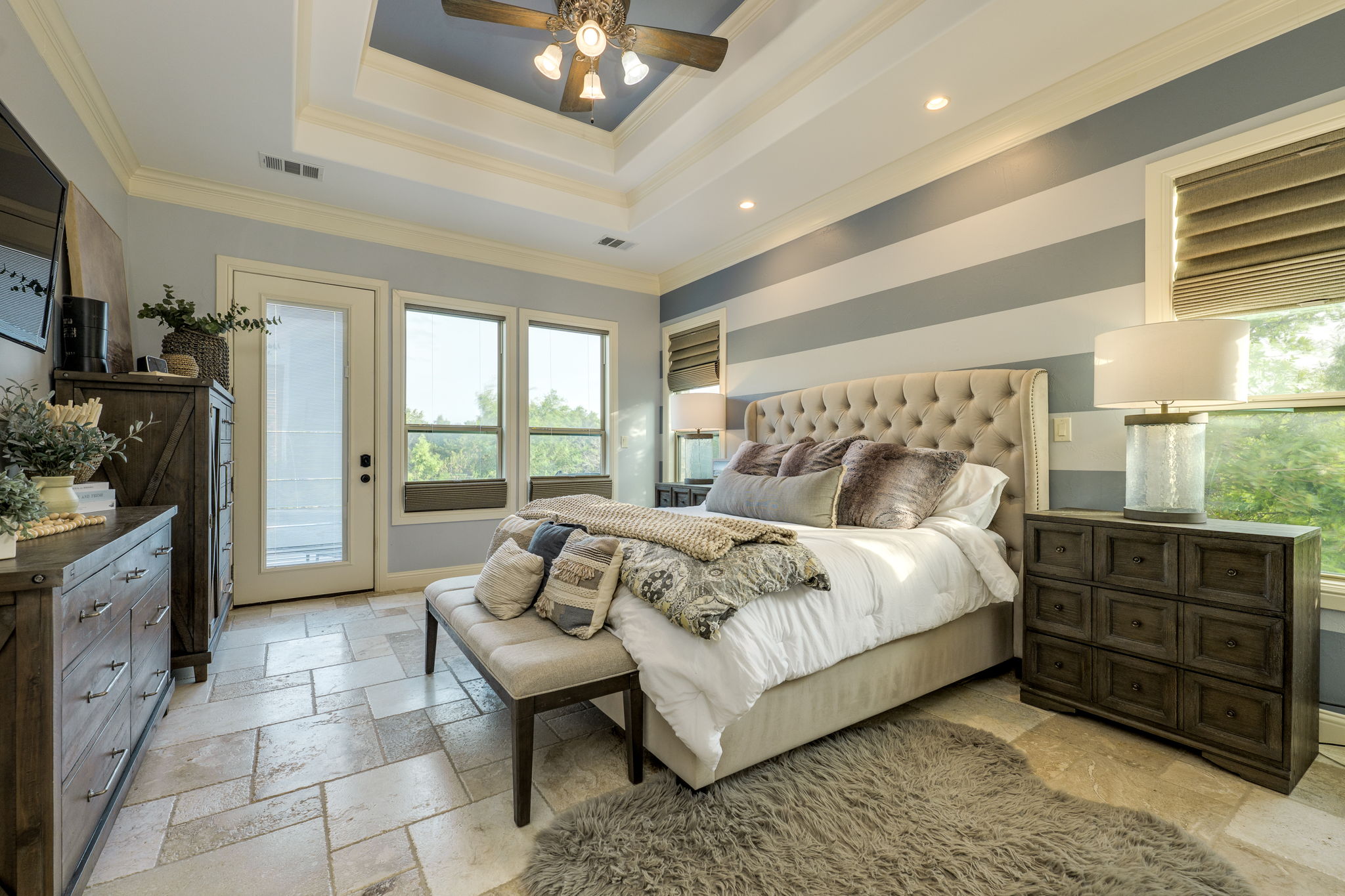 2703 Pyramid Drive Austin, TX 78734 - Photo 20 of 37 a spacious bedroom with a bed and a dresser