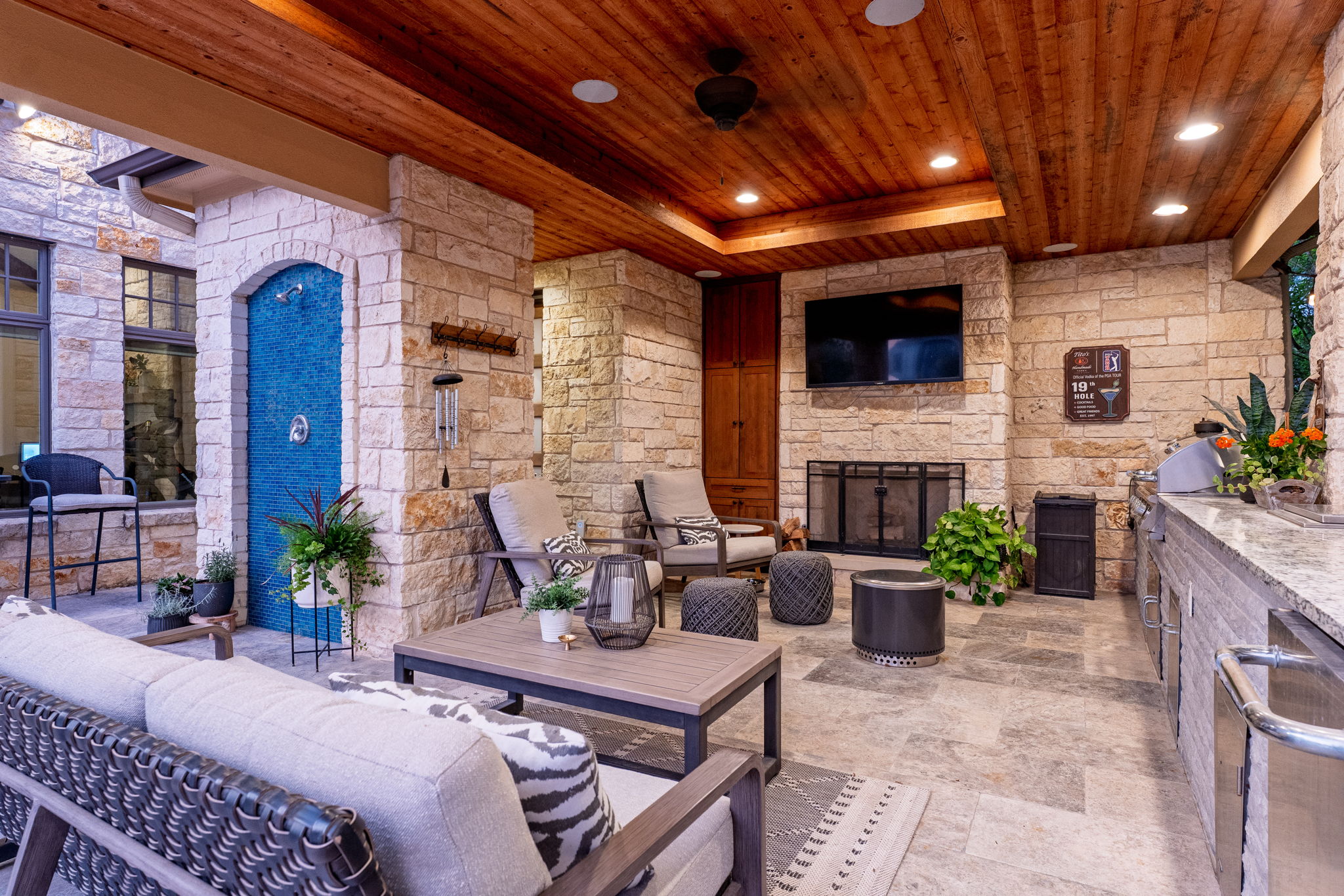 2703 Pyramid Drive Austin, TX 78734 - Photo 33 of 37 a view of a patio with couches table and chairs with potted plants