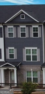 a front view of a house with parking