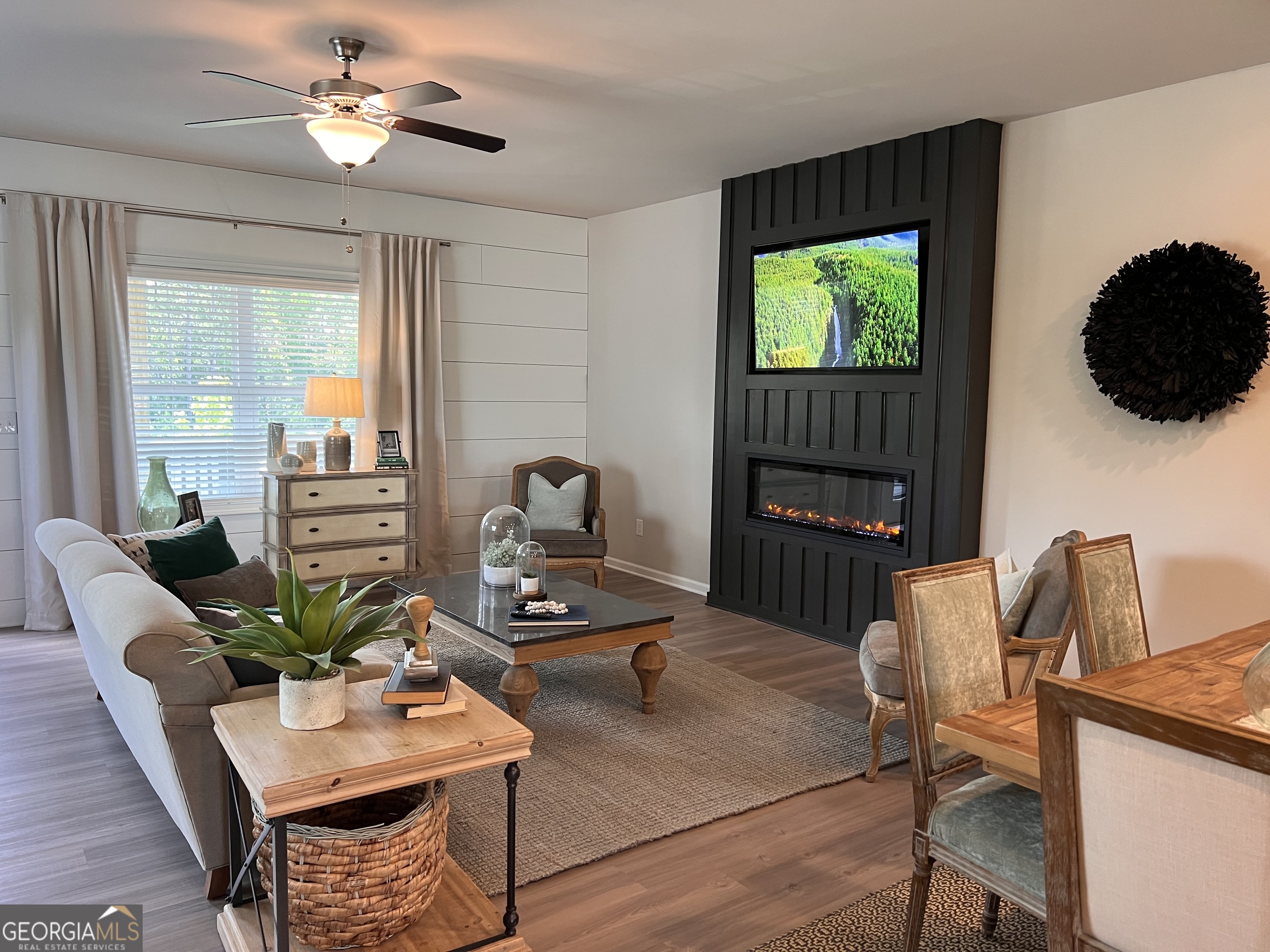 35 Cobalt Lane, Unit 81 Newnan, GA 30265 - Photo 7 of 30 a living room with furniture and a flat screen tv