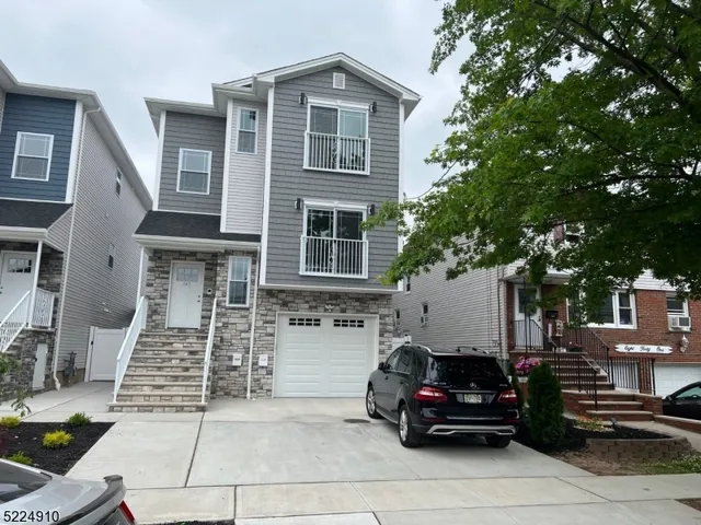 a car parked in front of a house