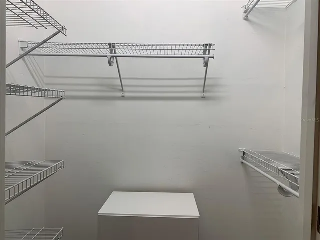 a bathroom with a sink and a shower