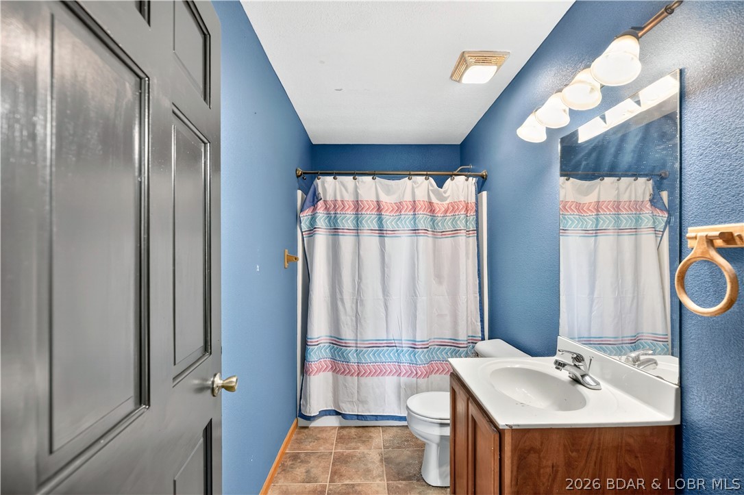 132 Hunters Ridge Road Camdenton, MO 65020 - Photo 23 of 44 Lower Level Bathroom