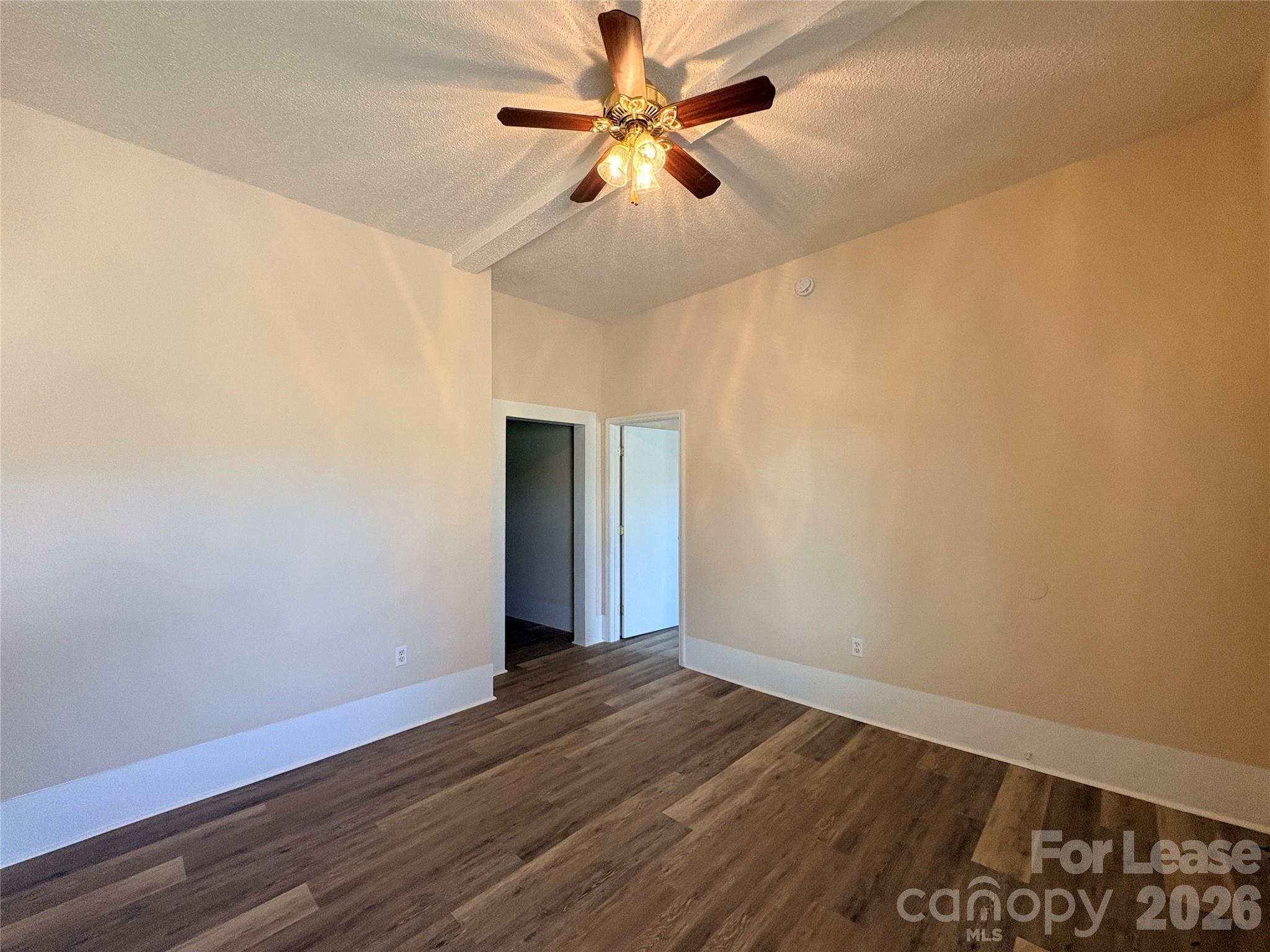 1109 6th Street, Unit B Lancaster, SC 29720 - Photo 5 of 22 wooden floor in an empty room
