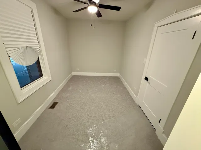 a view of a livingroom with a staircase