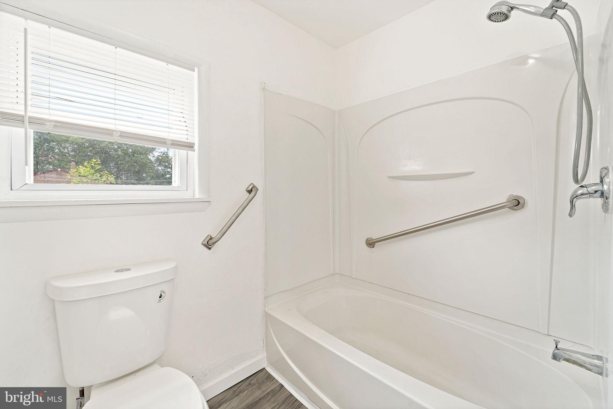 5 Sicklerville Road Sicklerville, NJ 08081 - Photo 13 of 25 a bathroom with a toilet and a bathtub