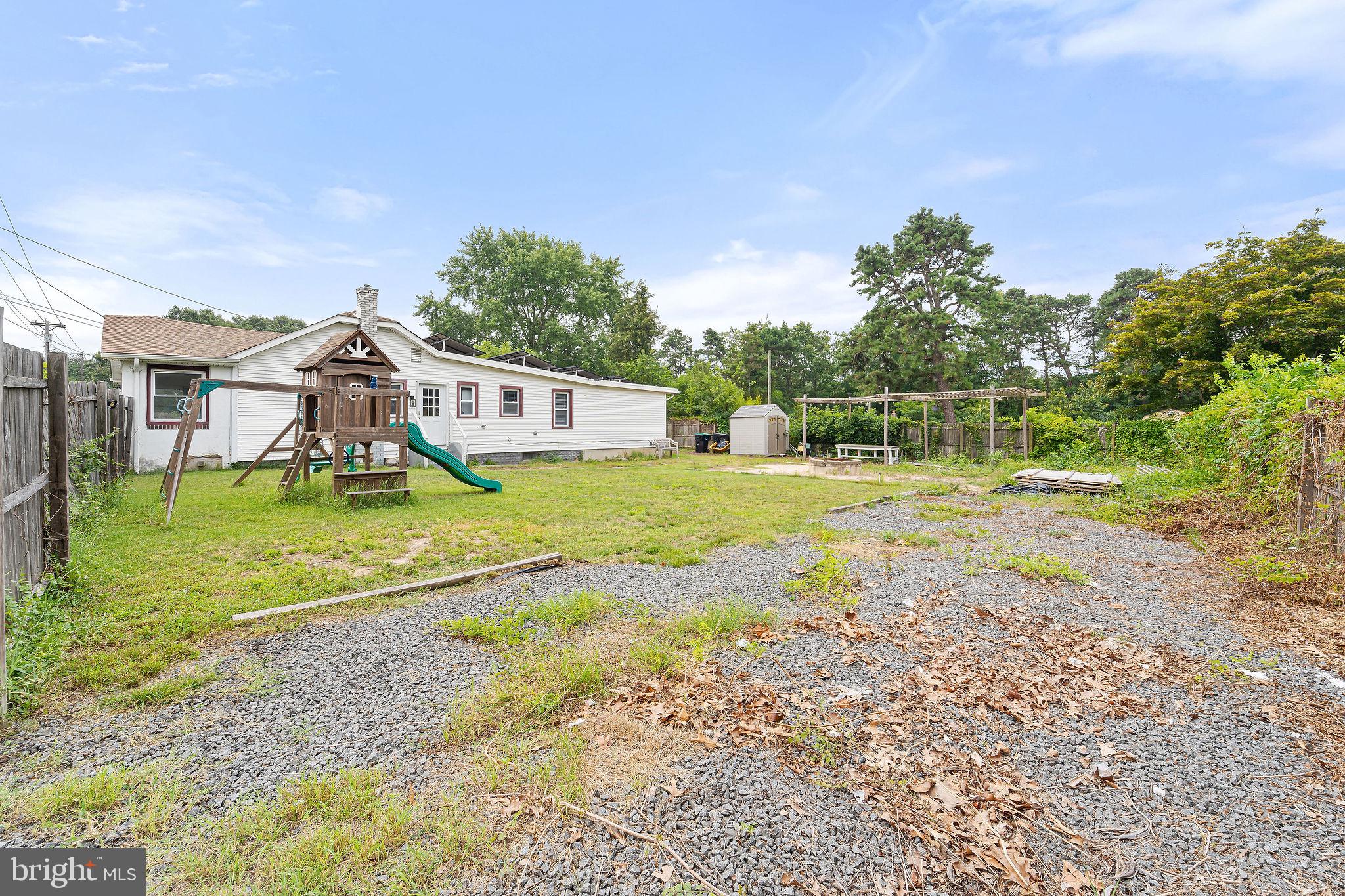 5 Sicklerville Road Sicklerville, NJ 08081 - Photo 21 of 25 a view of a house with a yard and sitting area