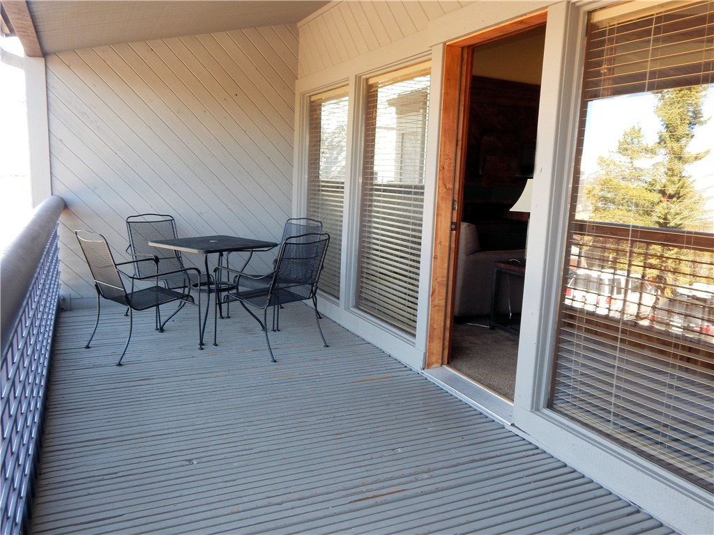 57 Fuller Placer Road, Unit 1B Breckenridge, CO 80424 - Photo 3 of 19 a view of a dining room with furniture and wooden floor