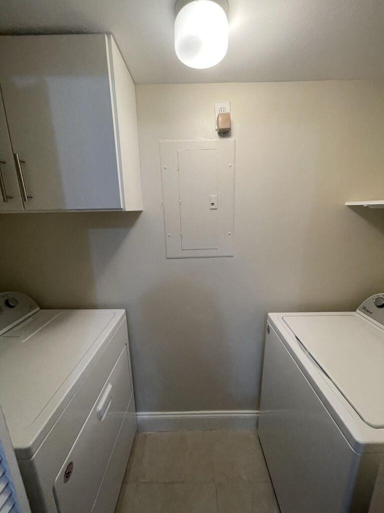1743 Village Boulevard, Unit 107 West Palm Beach, FL 33409 - Photo 16 of 16 1743 Village Blvd 107 Utility room