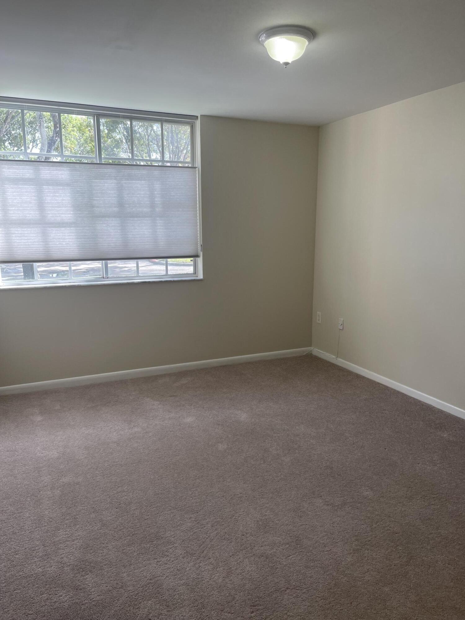 1743 Village Boulevard, Unit 107 West Palm Beach, FL 33409 - Photo 4 of 16 IMG_6877