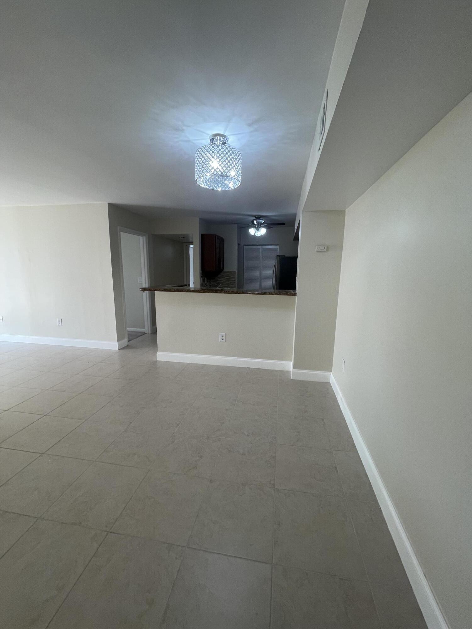 1743 Village Boulevard, Unit 107 West Palm Beach, FL 33409 - Photo 9 of 16 IMG_6884