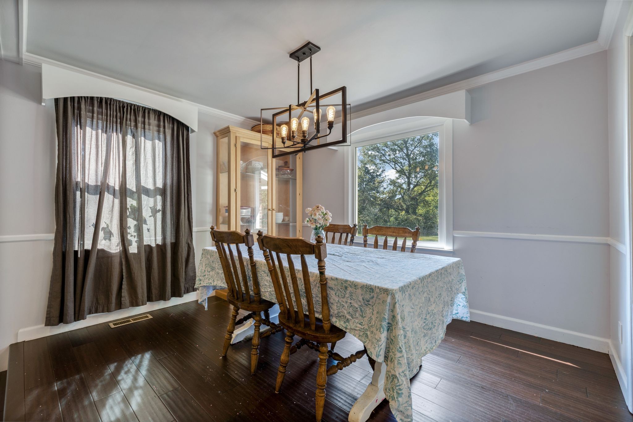 4165 Clovercroft Road Franklin, TN 37067 - Photo 12 of 27 a view of a dining room with furniture window and wooden floor