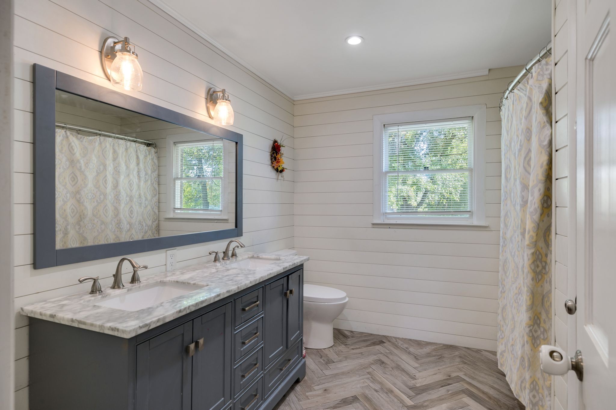 4165 Clovercroft Road Franklin, TN 37067 - Photo 23 of 27 a bathroom with a granite countertop sink toilet and shower