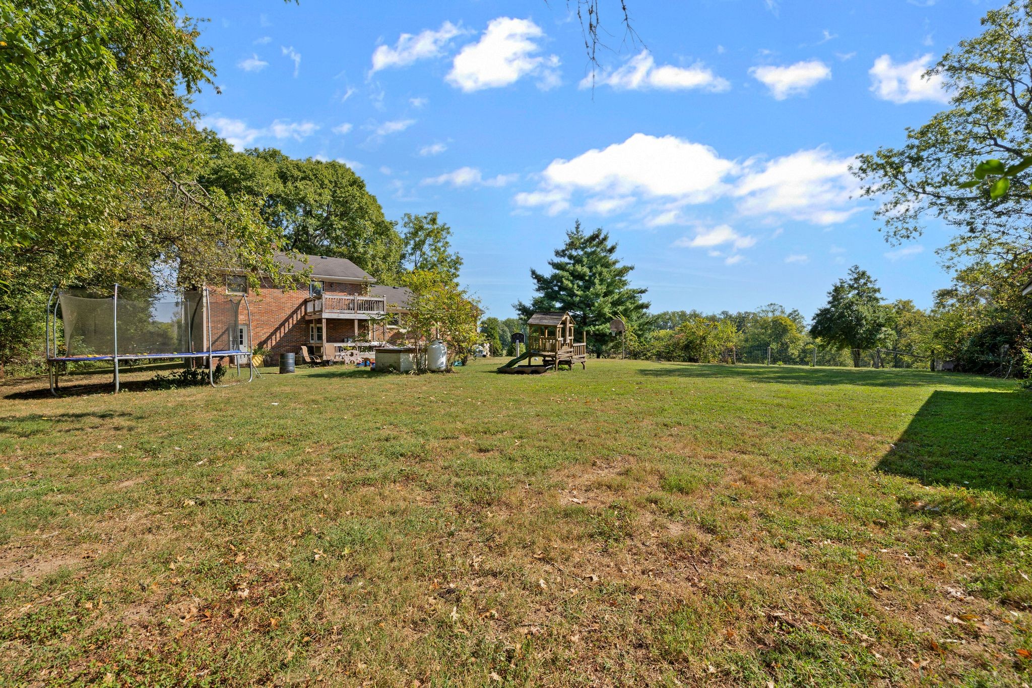 4165 Clovercroft Road Franklin, TN 37067 - Photo 25 of 27 a view of a house with a yard