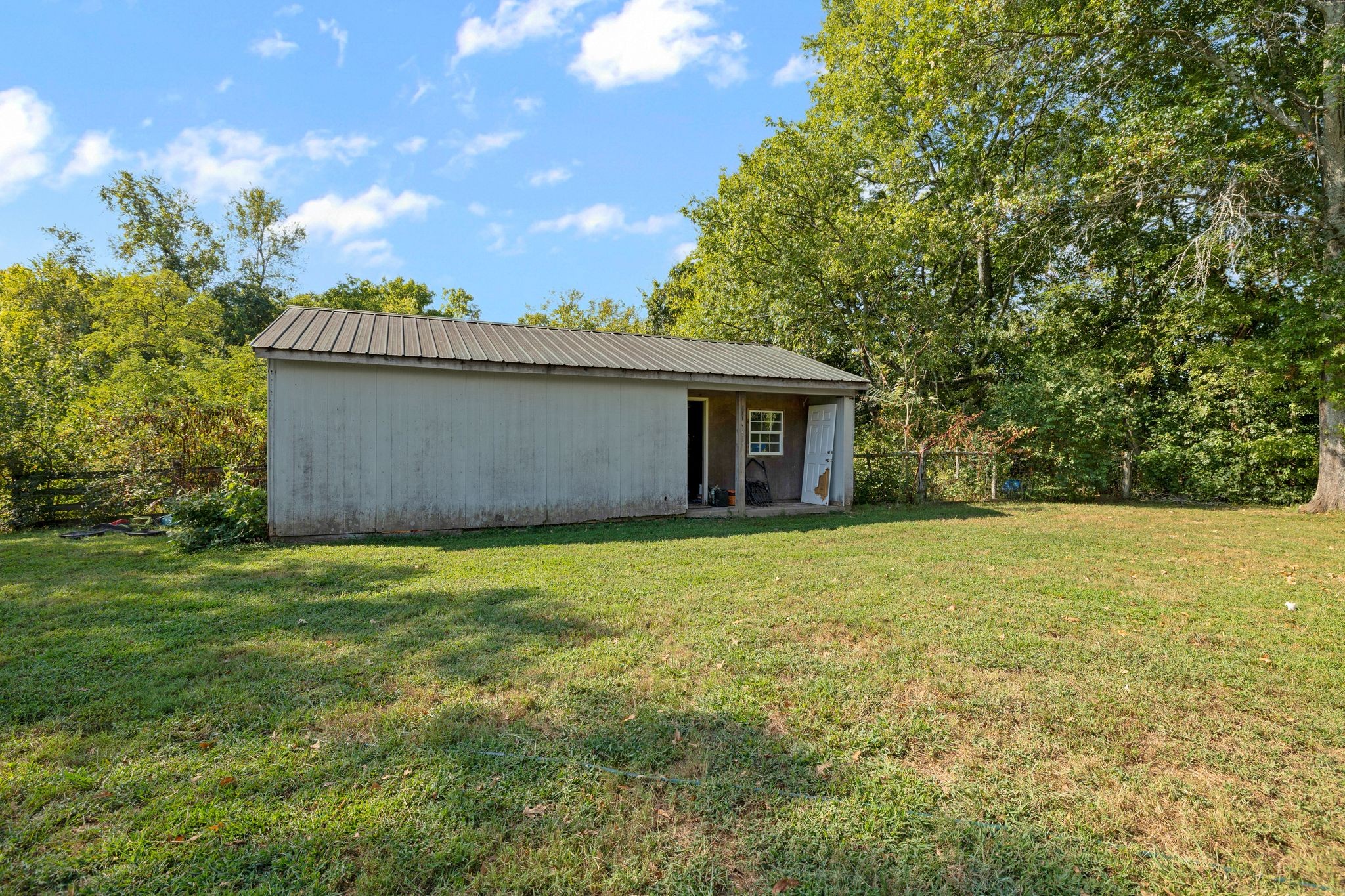 4165 Clovercroft Road Franklin, TN 37067 - Photo 27 of 27 a view of a house with a garden