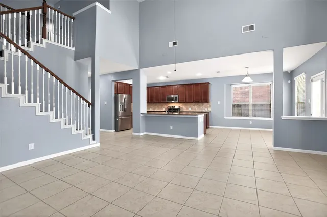 a bathroom with a sink a mirror and a toilet