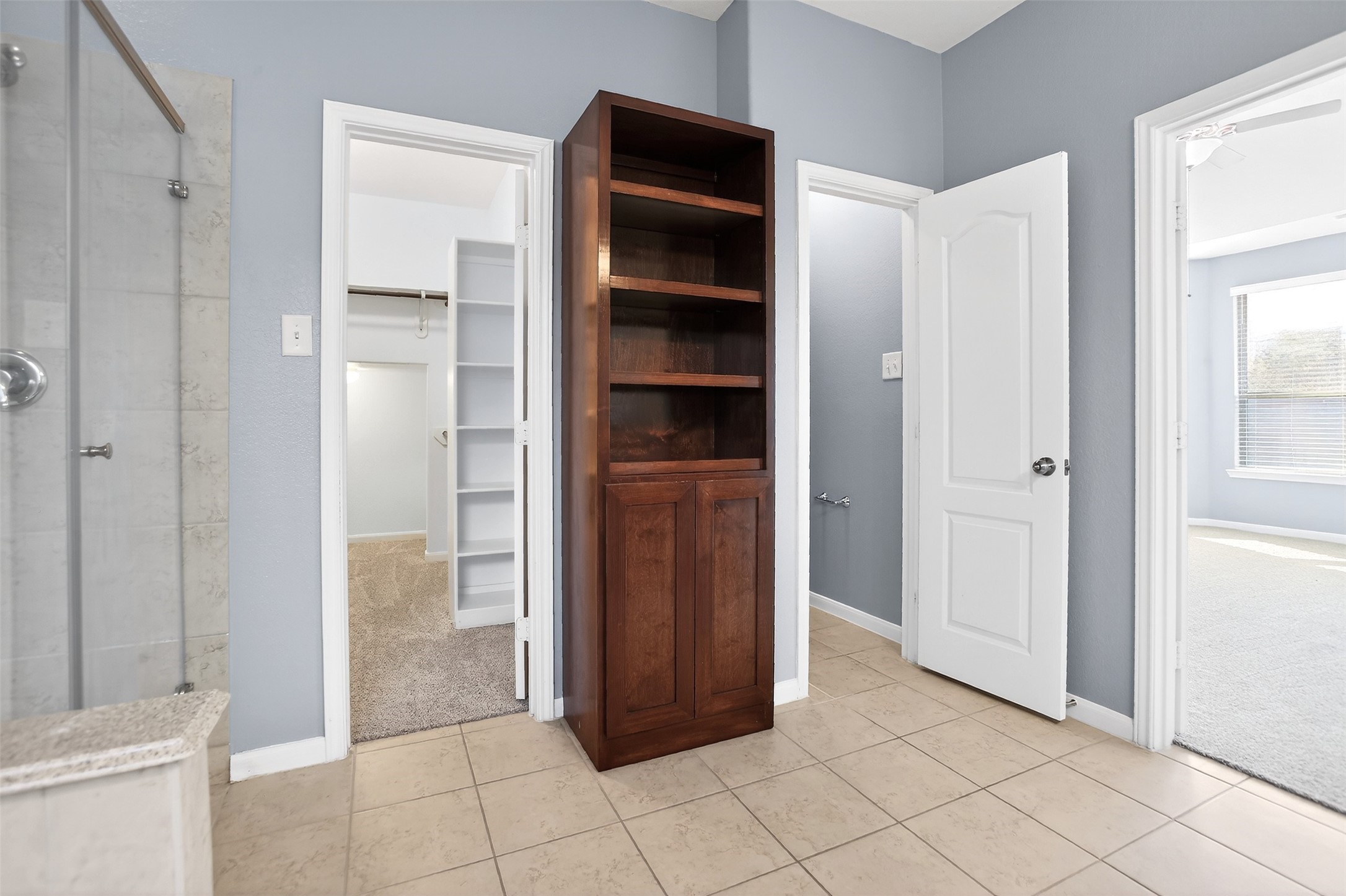 25315 Terrain Park Drive Spring, TX 77373 - Photo 20 of 47 Also includes custom built-in storage cabinet and open linen shelves