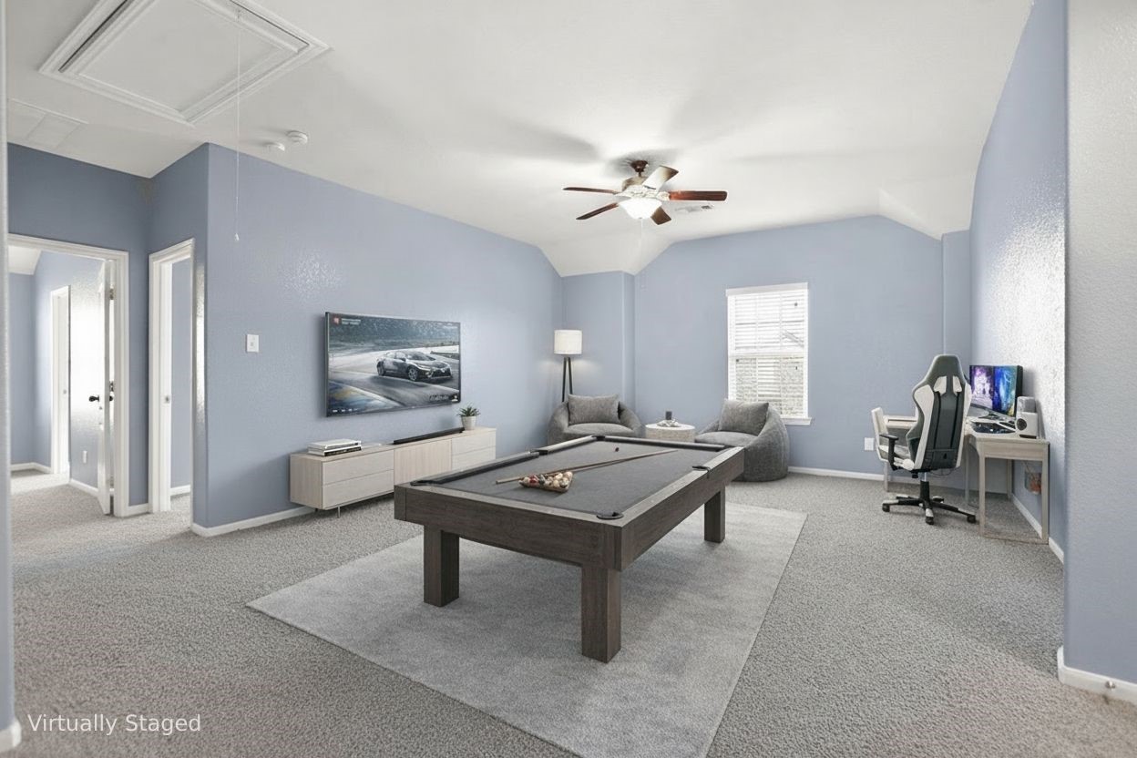 25315 Terrain Park Drive Spring, TX 77373 - Photo 23 of 47 a living room with furniture a desk and chair