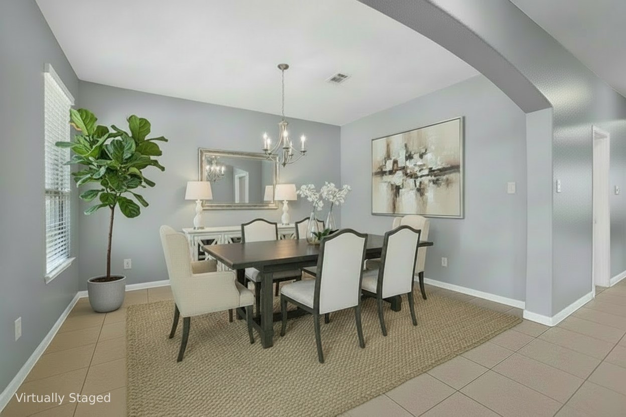 25315 Terrain Park Drive Spring, TX 77373 - Photo 3 of 47 a view of a dining room with furniture and a chandelier
