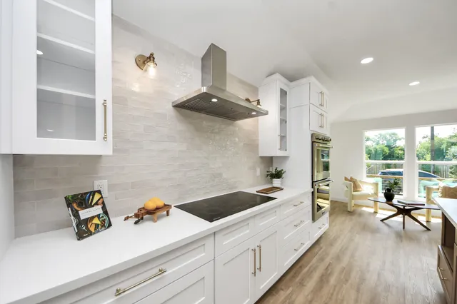 a kitchen with a sink and stove