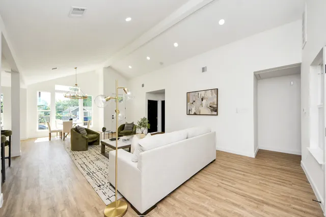 a bed room with a bed and a window