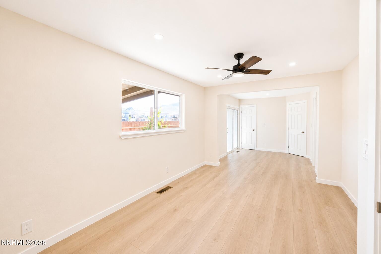 742 Ruth Street Carson City, NV 89701 - Photo 11 of 25 a view of empty room with wooden floor