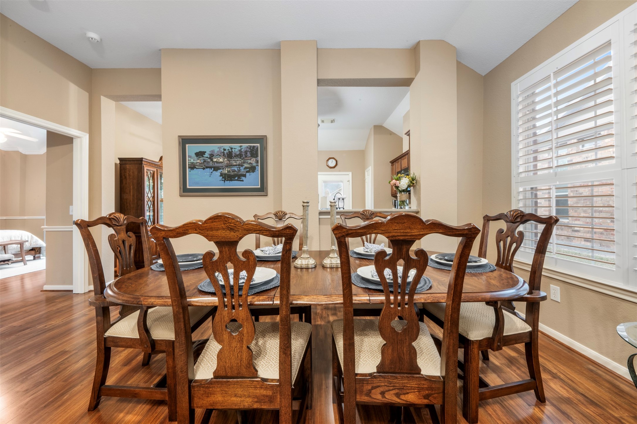 9635 Old Timber Lane Spring, TX 77379 - Photo 12 of 48 a view of a dining room with furniture and wooden floor