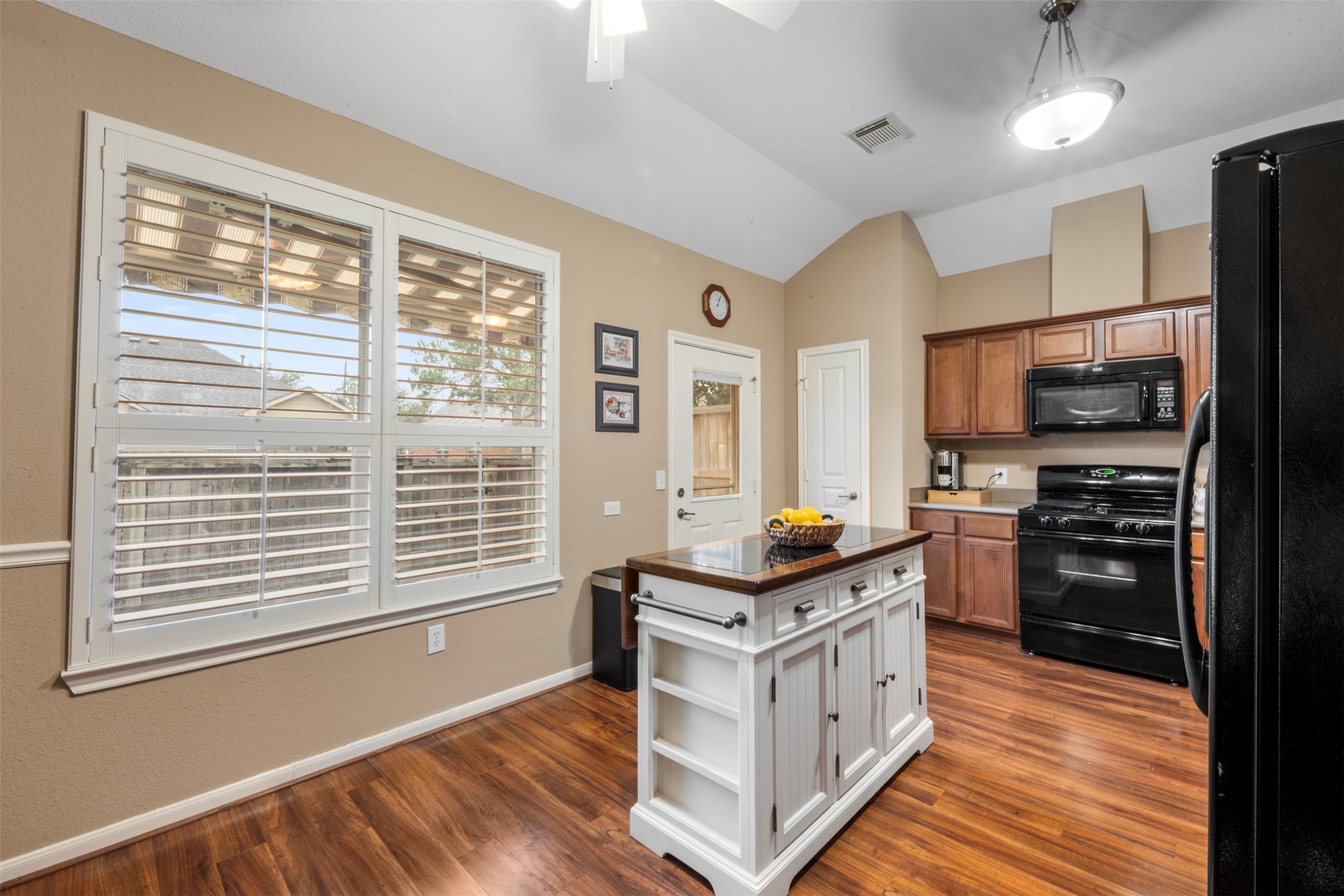 9635 Old Timber Lane Spring, TX 77379 - Photo 14 of 48 a kitchen with stainless steel appliances a stove sink and microwave