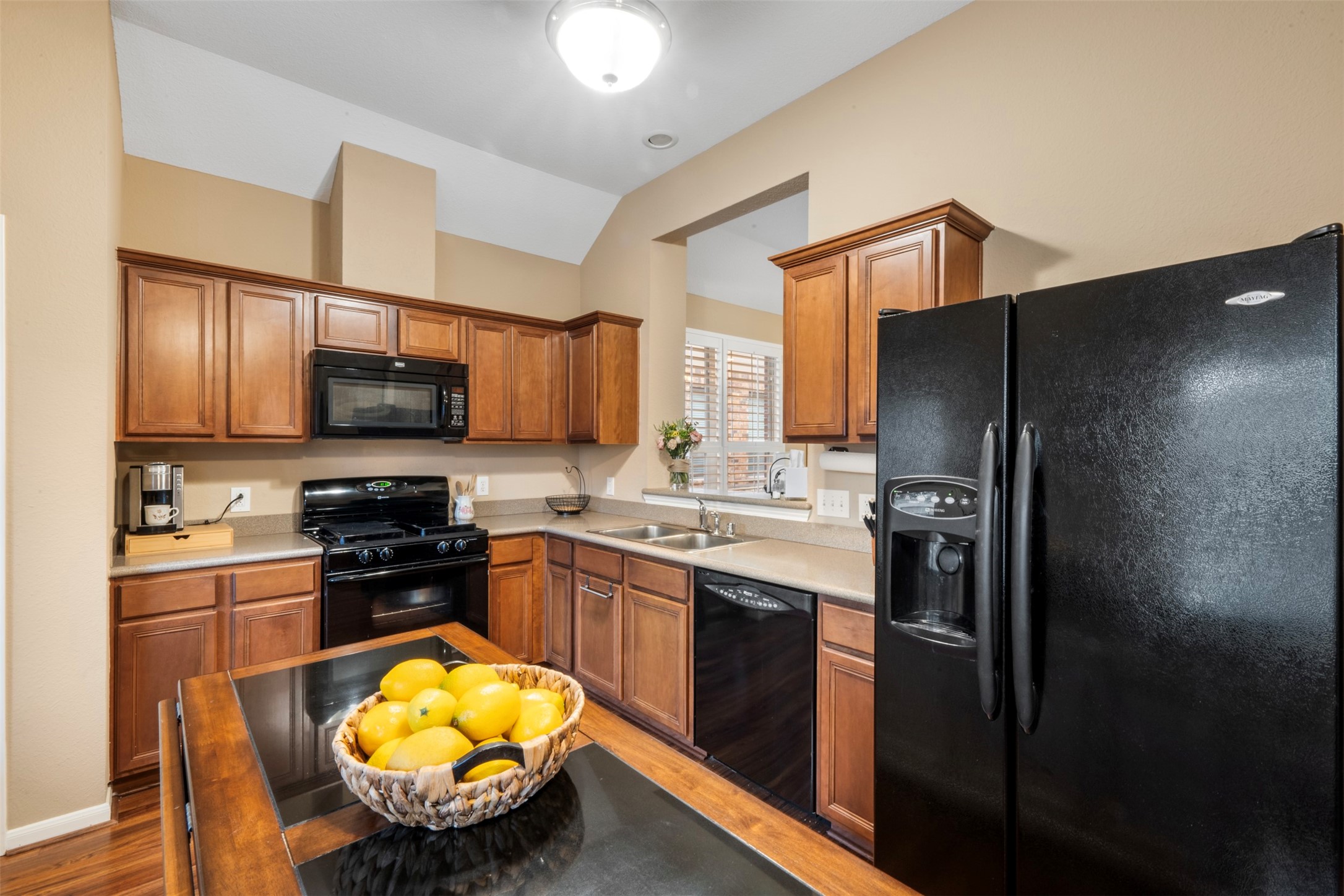 9635 Old Timber Lane Spring, TX 77379 - Photo 15 of 48 a kitchen with stainless steel appliances granite countertop a stove refrigerator and microwave