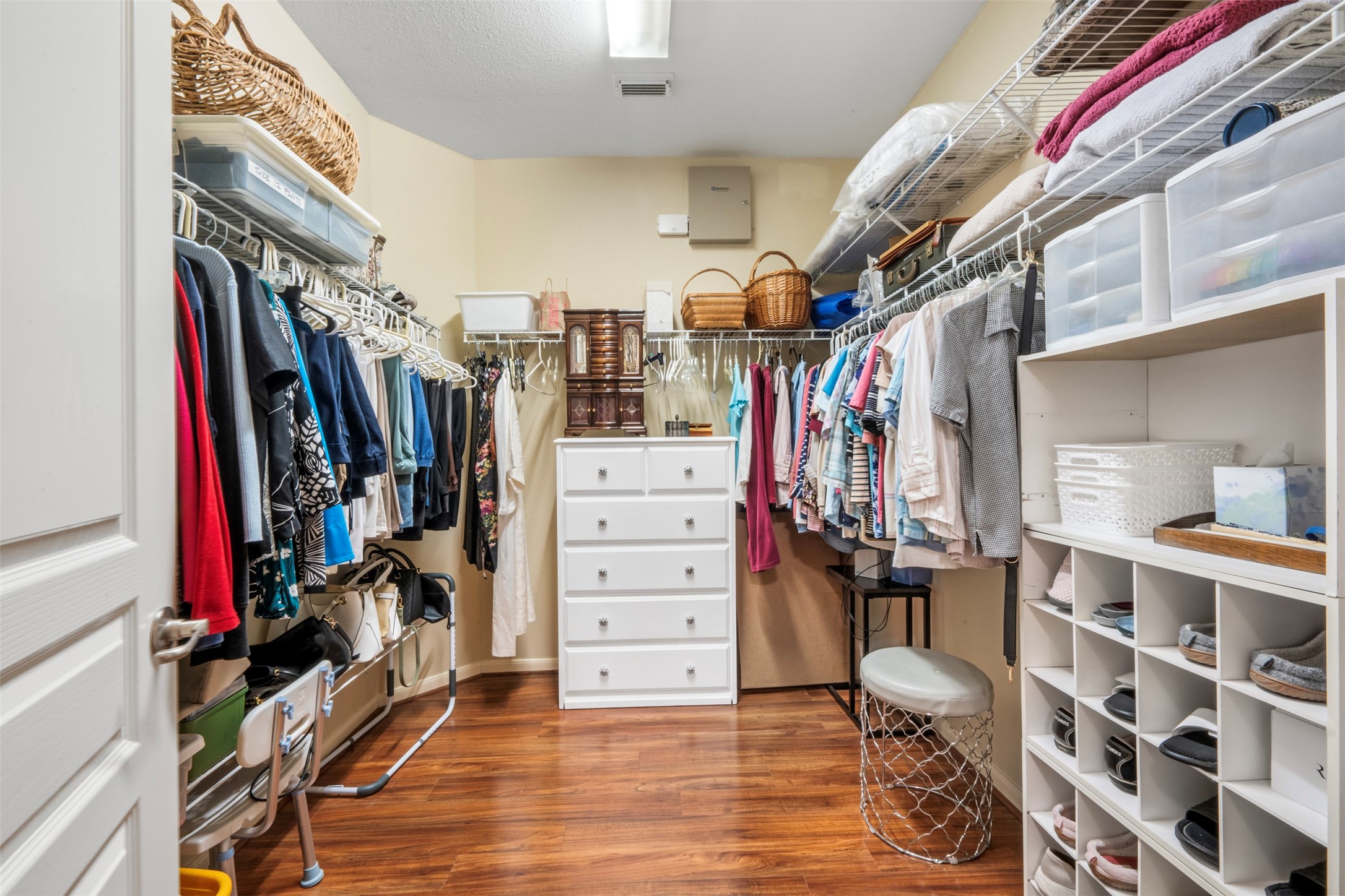 9635 Old Timber Lane Spring, TX 77379 - Photo 23 of 48 a view of walk in closet with clothes and shoes