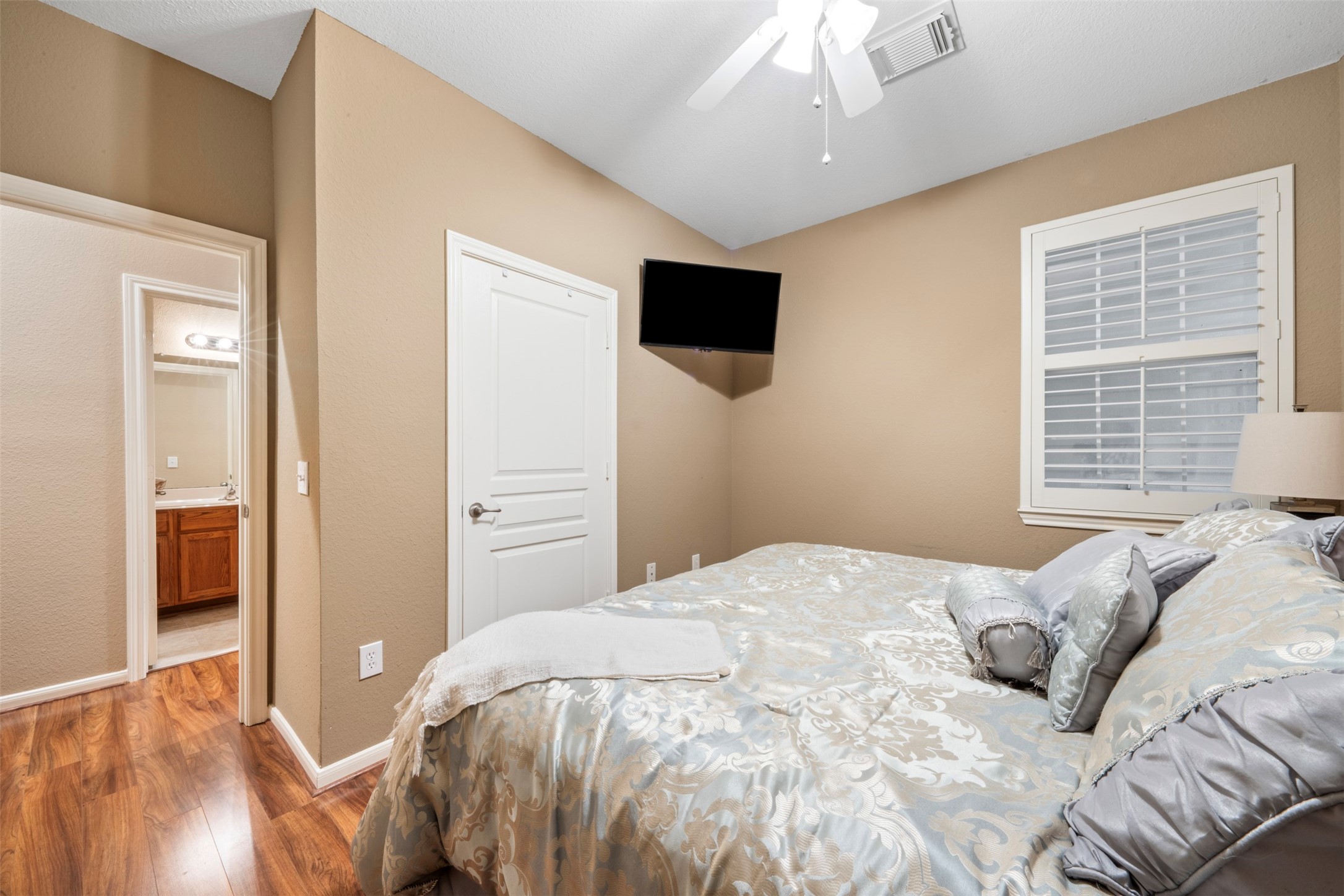 9635 Old Timber Lane Spring, TX 77379 - Photo 25 of 48 a bedroom with a bed and a tv