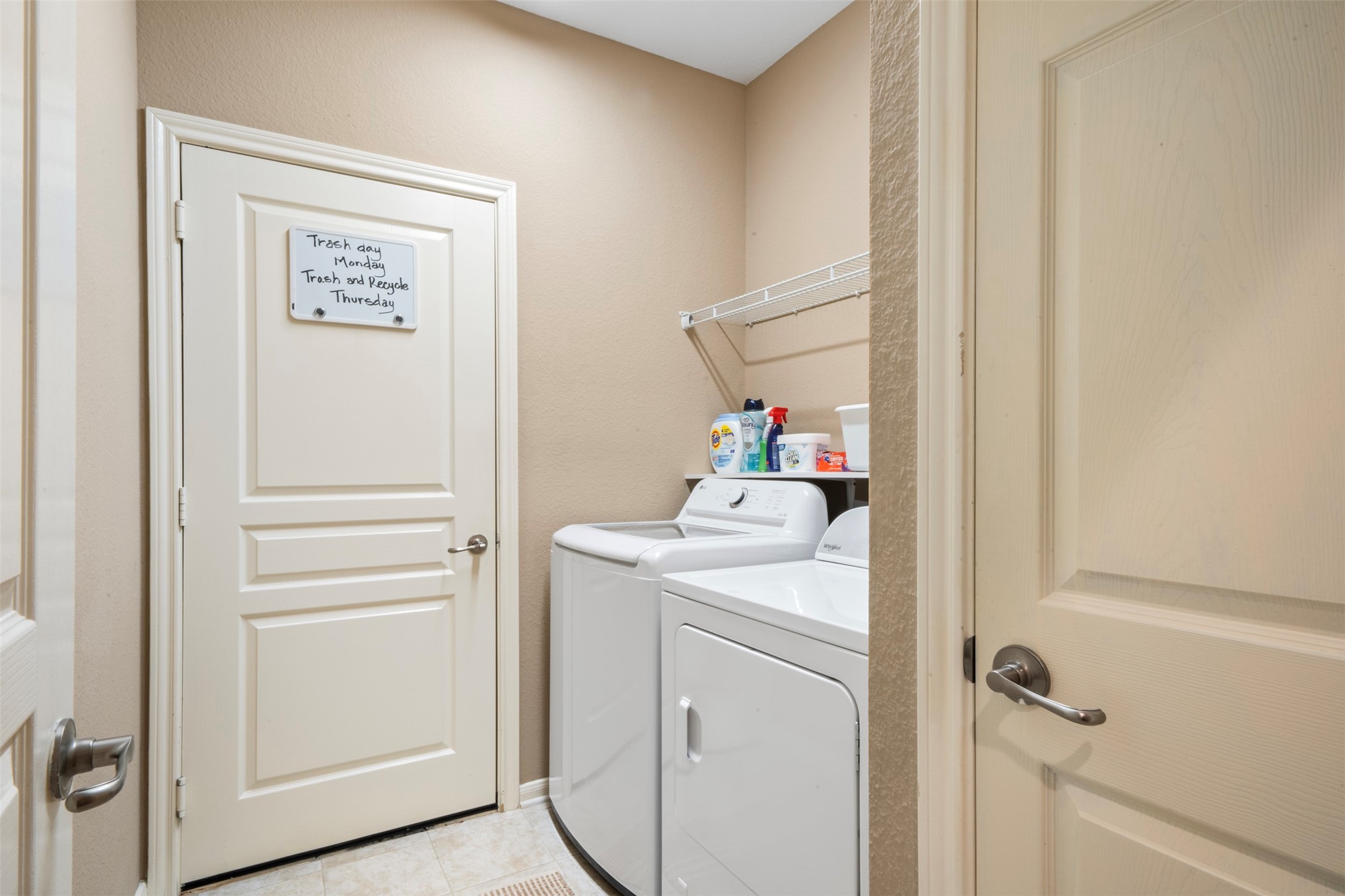 9635 Old Timber Lane Spring, TX 77379 - Photo 27 of 48 a storage room with washer and dryer