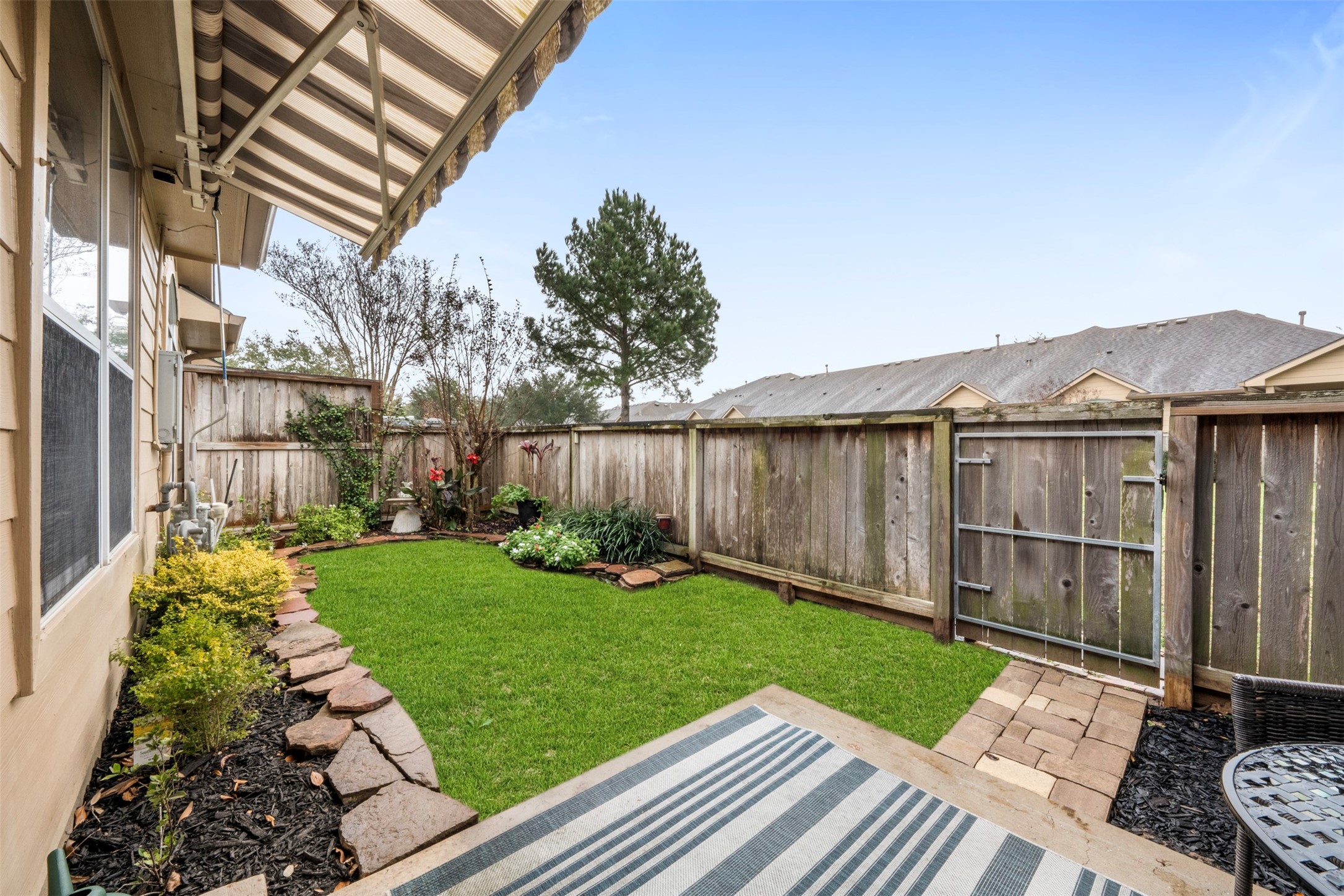 9635 Old Timber Lane Spring, TX 77379 - Photo 30 of 48 a view of a house with a yard