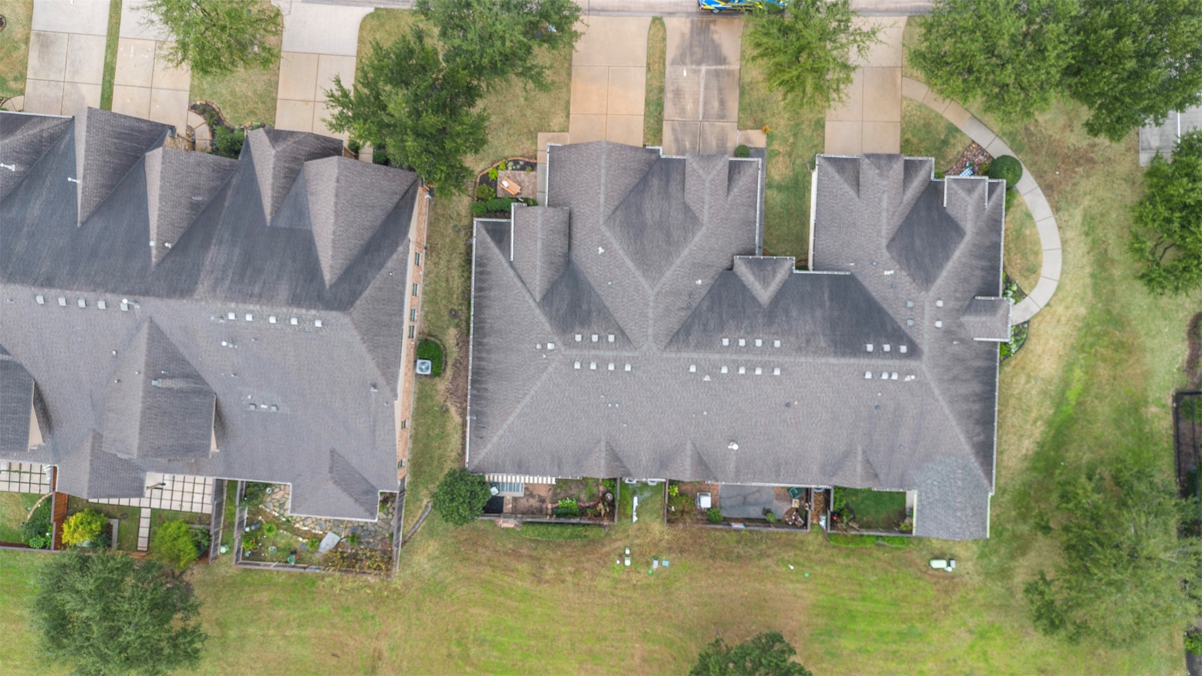 9635 Old Timber Lane Spring, TX 77379 - Photo 35 of 48 an aerial view of residential houses with outdoor space and swimming pool