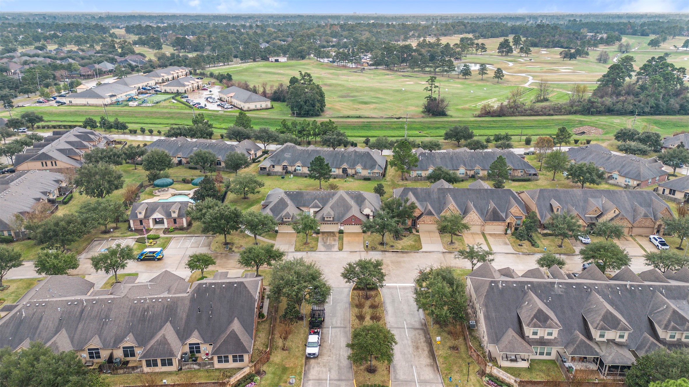 9635 Old Timber Lane Spring, TX 77379 - Photo 37 of 48 an aerial view of residential houses with outdoor space and city view