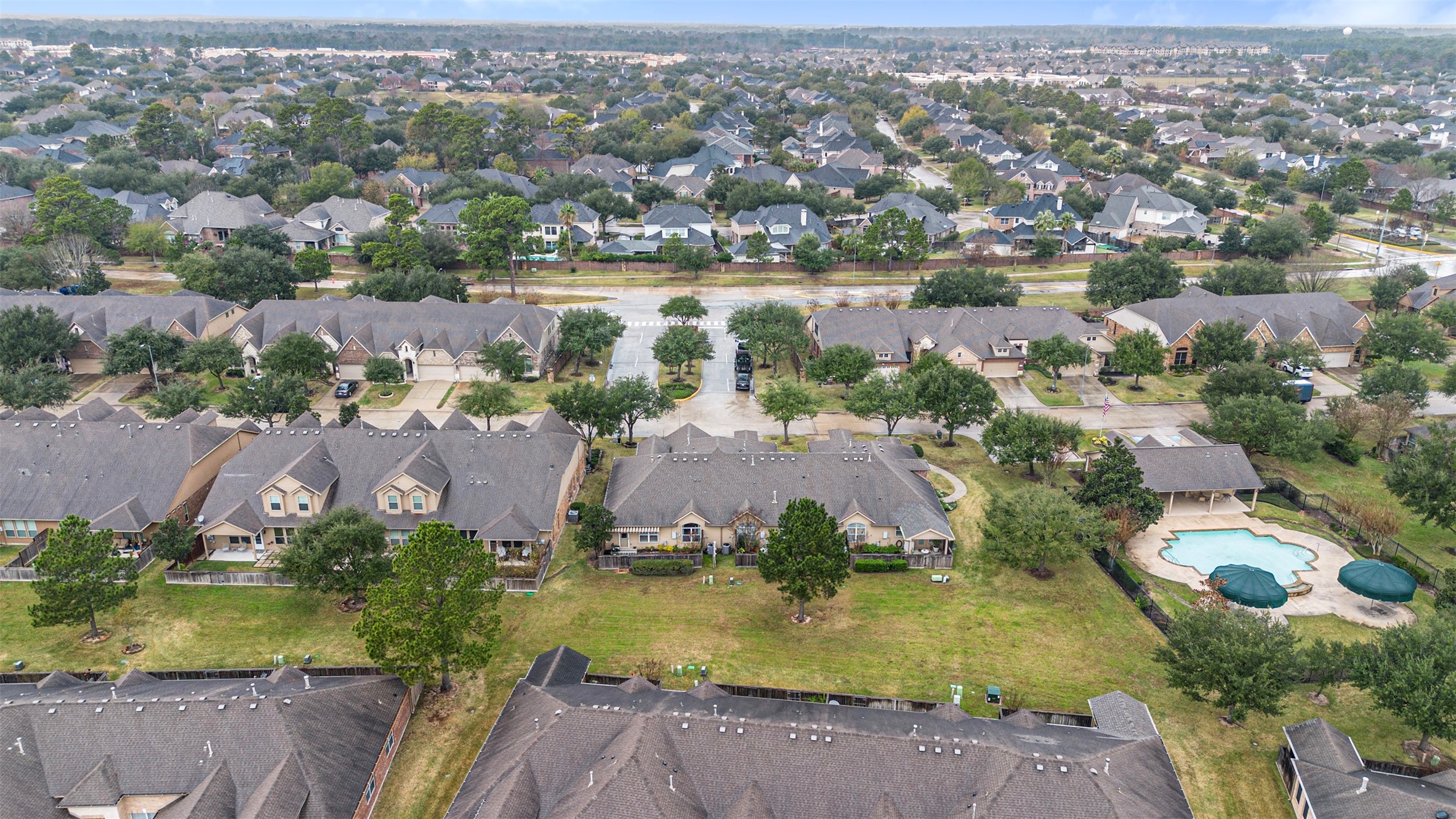 9635 Old Timber Lane Spring, TX 77379 - Photo 39 of 48 an aerial view of residential houses with outdoor space and lake view