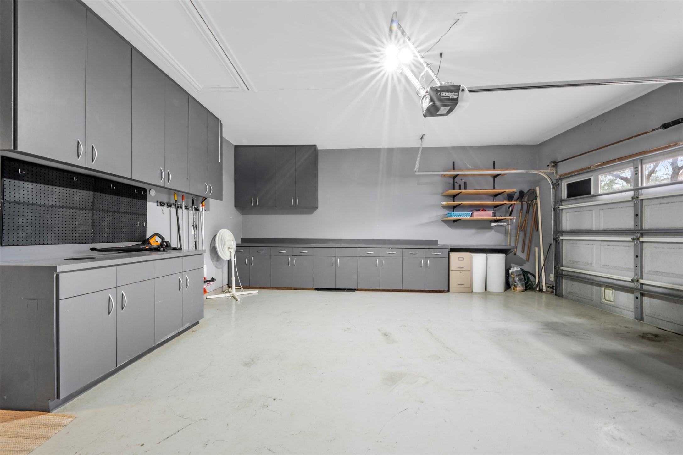 9635 Old Timber Lane Spring, TX 77379 - Photo 4 of 48 a kitchen with stainless steel appliances granite countertop a sink and a stove top oven