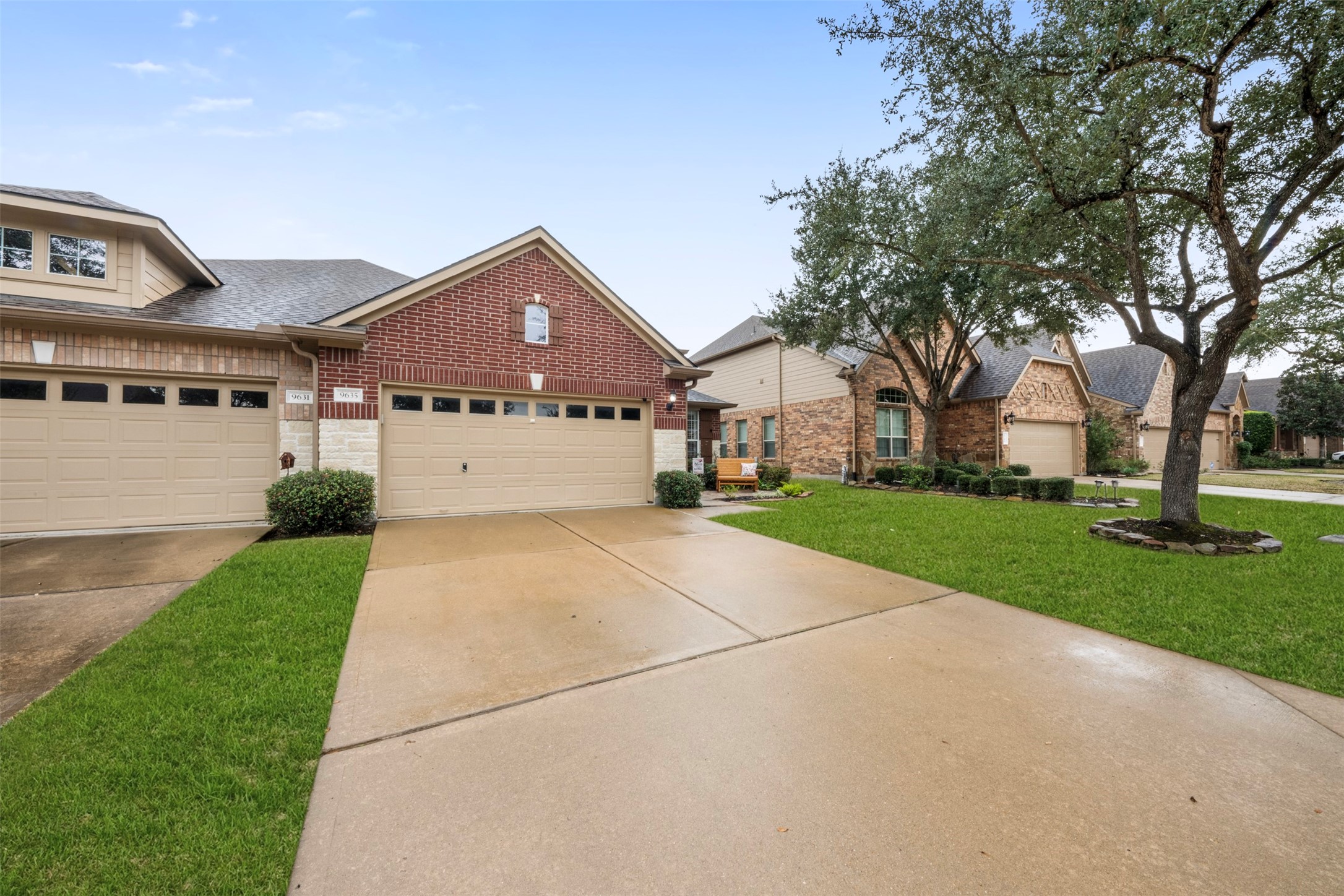 9635 Old Timber Lane Spring, TX 77379 - Photo 47 of 48 a front view of a house with a yard and garage