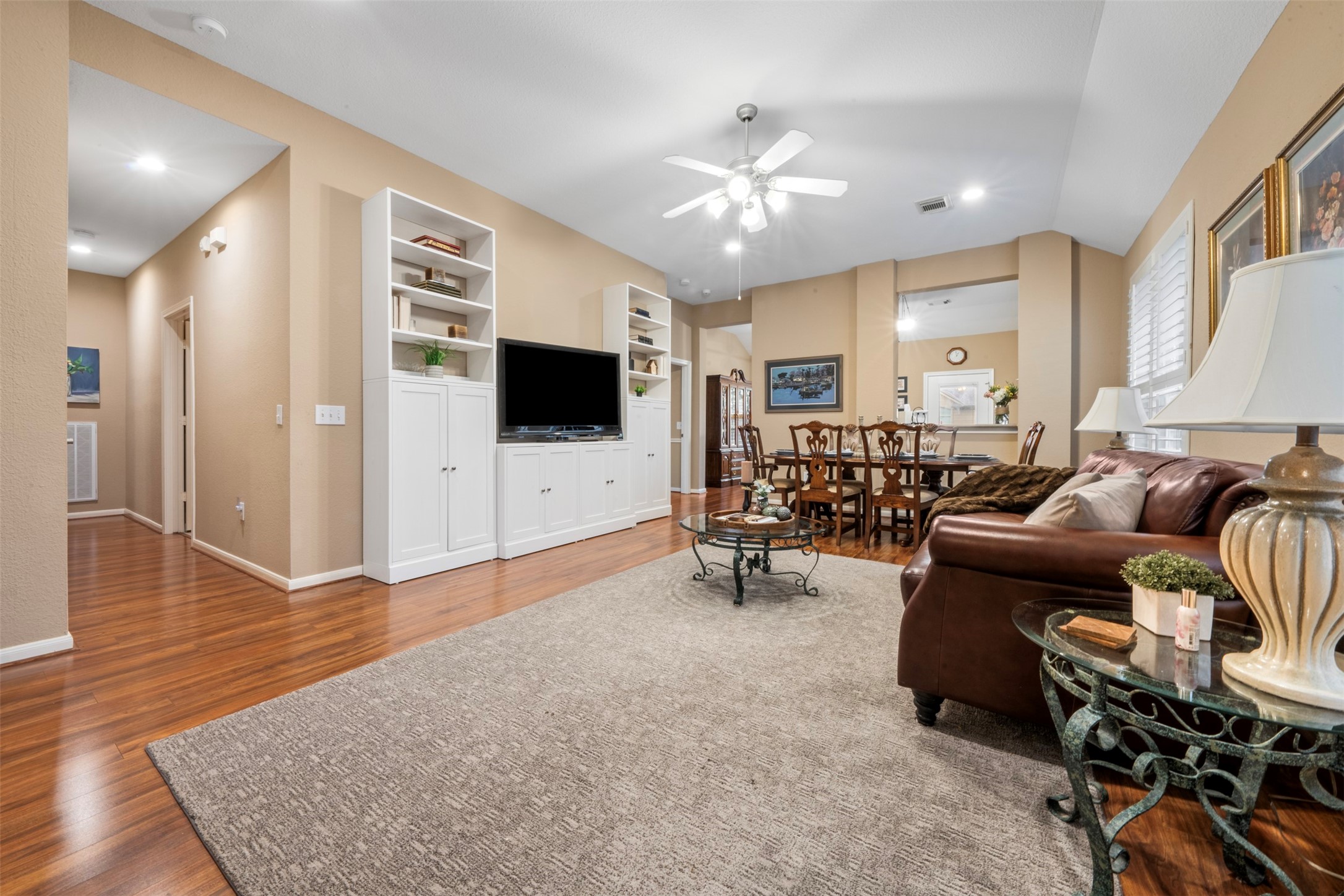 9635 Old Timber Lane Spring, TX 77379 - Photo 7 of 48 a living room with furniture and a flat screen tv
