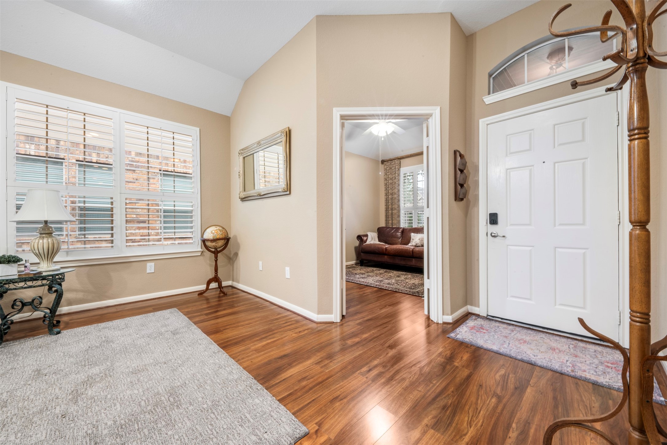 9635 Old Timber Lane Spring, TX 77379 - Photo 8 of 48 a view of a livingroom with wooden floor and windows