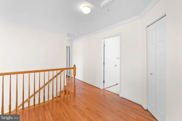 a view of entryway with wooden floor