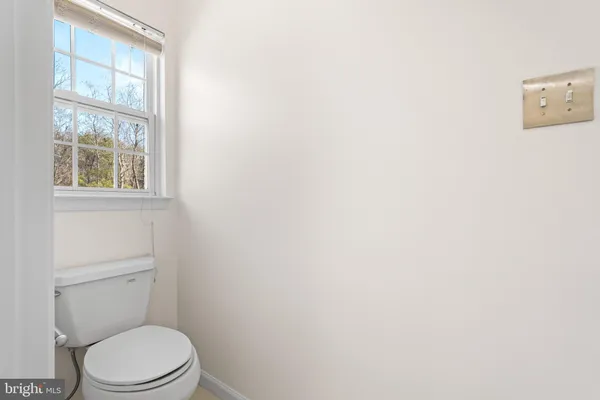 a bathroom with a sink toilet and bathtub