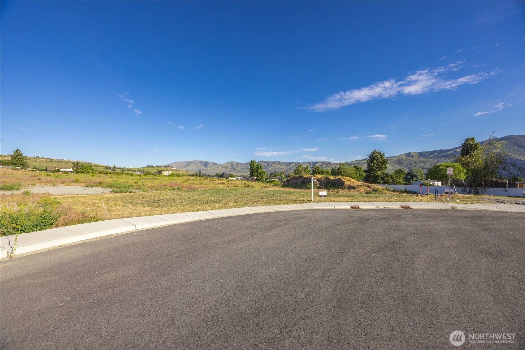 145 Sailing Hawk Lane Manson, WA 98831 - Photo 1 of 37 a view of an ocean and beach