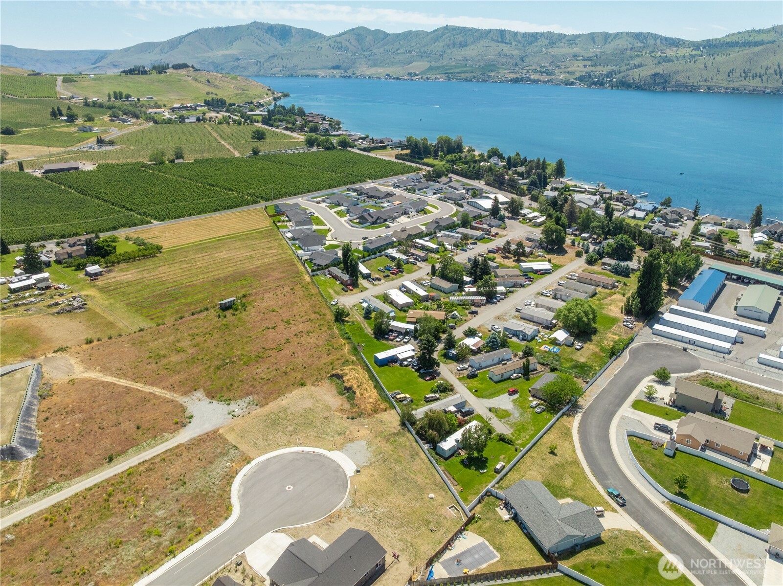 145 Sailing Hawk Lane Manson, WA 98831 - Photo 21 of 37 an aerial view of a house with a lake view
