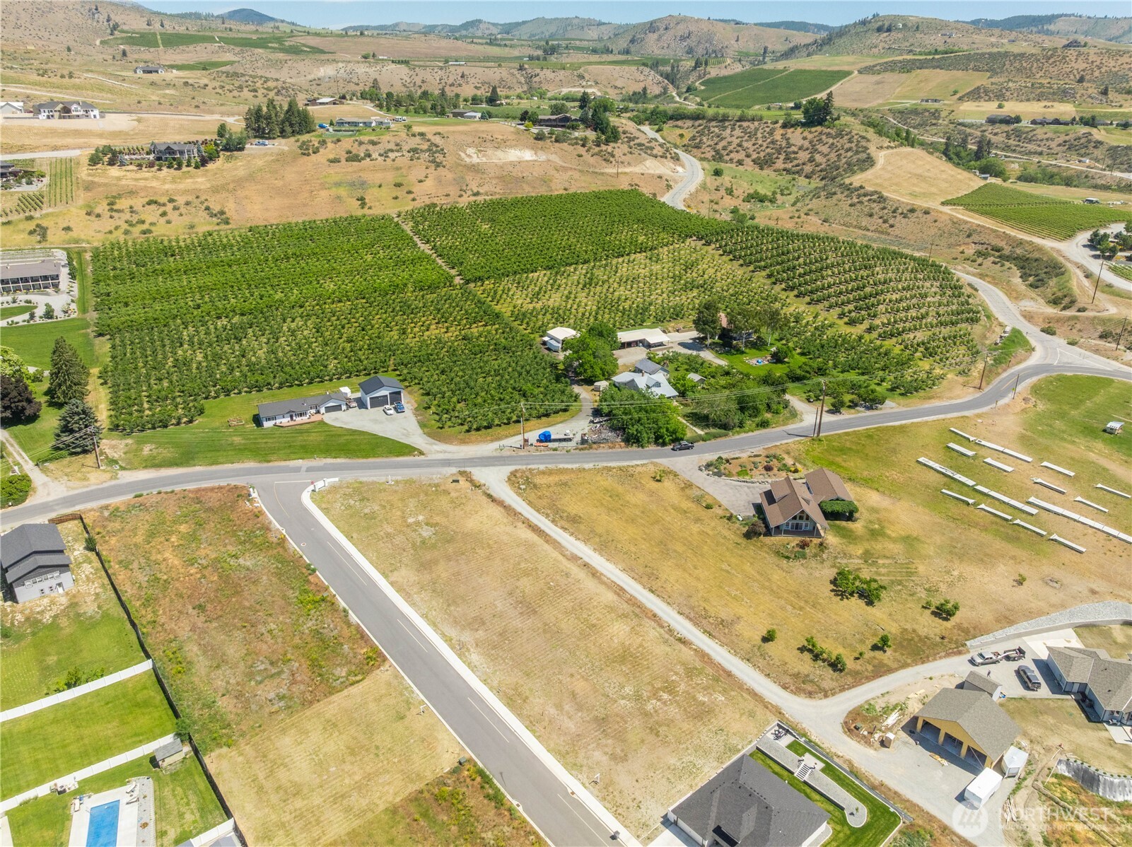 145 Sailing Hawk Lane Manson, WA 98831 - Photo 32 of 37 an aerial view of residential houses with outdoor space and river