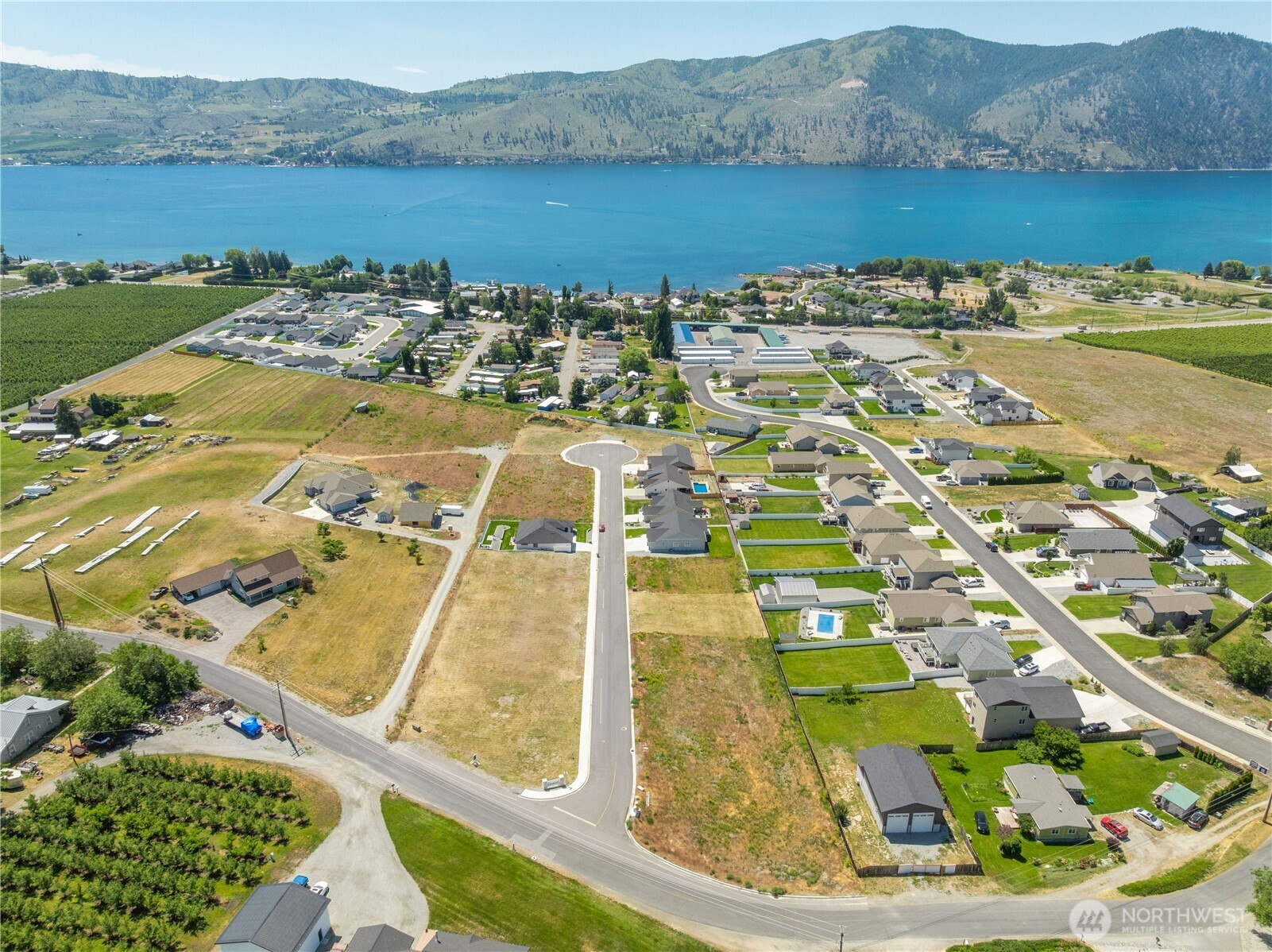 145 Sailing Hawk Lane Manson, WA 98831 - Photo 37 of 37 a view of a lake with a mountain