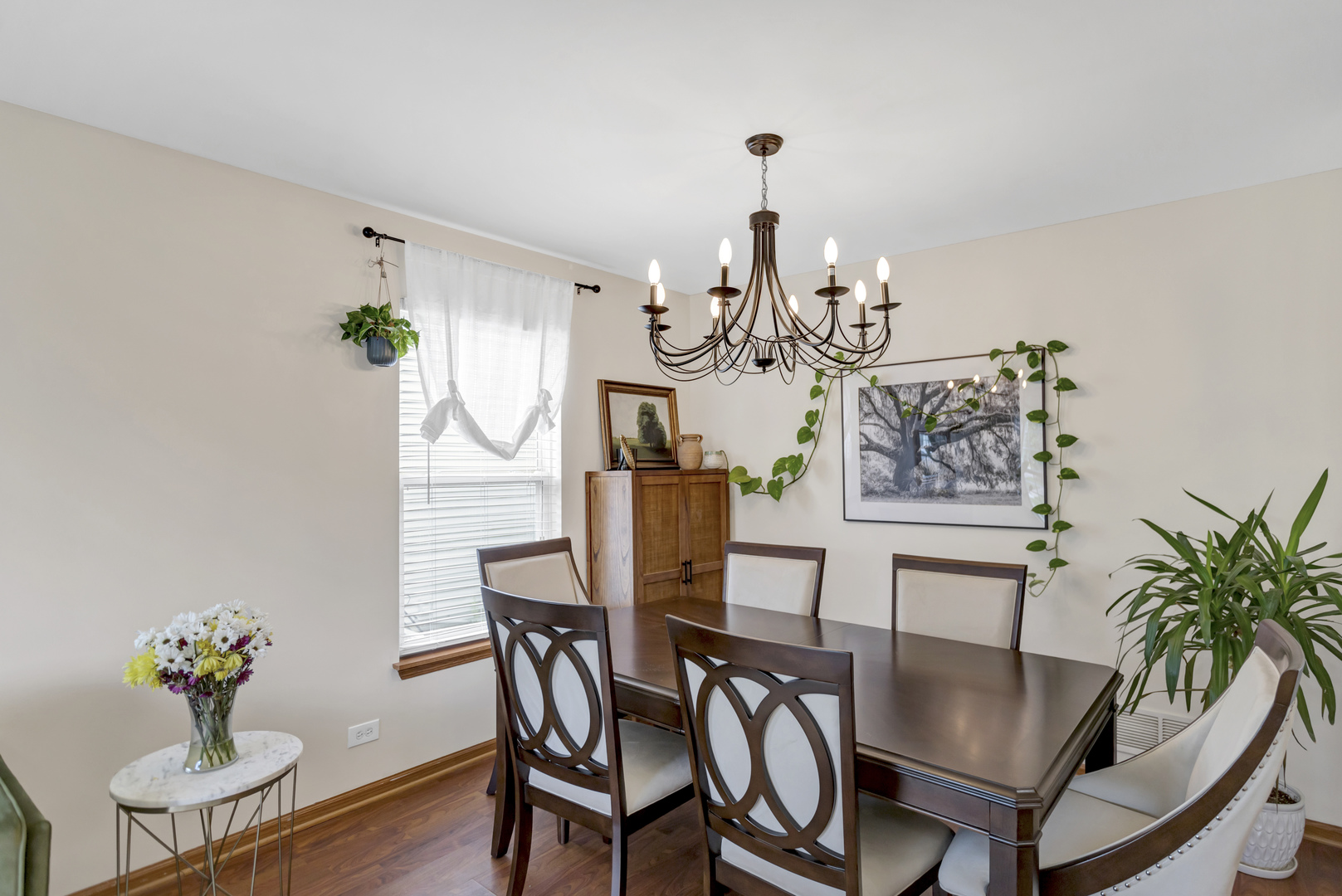 2112 Wicklow Lane Round Lake, IL 60073 - Photo 16 of 34 a view of a dining room with furniture and chandelier