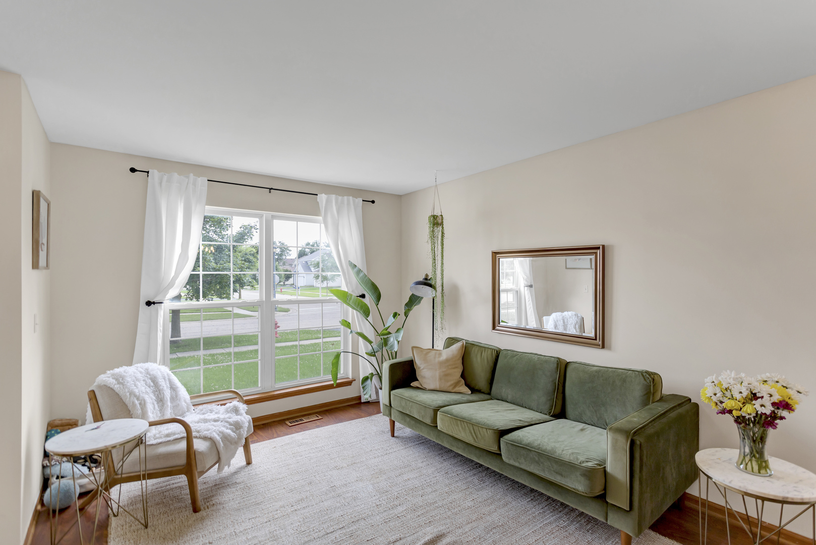 2112 Wicklow Lane Round Lake, IL 60073 - Photo 18 of 34 a living room with furniture and a large window